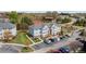 Wide aerial of a well-maintained condo complex with ample parking and landscaping at 3471 Forestdale Drive # 3C, Burlington, NC 27215