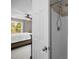 Bright bathroom featuring a shower and glimpses into an adjacent bedroom with natural light at 3471 Forestdale Drive # 3C, Burlington, NC 27215
