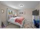 Cozy bedroom featuring a comfortable bed, soft carpet, and a charming window view at 3471 Forestdale Drive # 3C, Burlington, NC 27215
