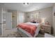 Comfortable bedroom with neutral walls, a window view, and warm, inviting ambiance at 3471 Forestdale Drive # 3C, Burlington, NC 27215