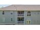 Exterior shot of condominium balconies with intricate white railings at 3471 Forestdale Drive # 3C, Burlington, NC 27215