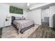 Comfortable bedroom with a bed, bedside tables and a cozy rug, perfect for relaxation at 416 Avery St, Garner, NC 27529
