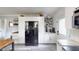 Bright kitchen featuring white cabinetry, granite countertops, stainless steel appliances, and modern fixtures at 416 Avery St, Garner, NC 27529