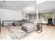 Spacious living room features tile flooring, recessed lighting, and a large comfortable grey sectional at 416 Avery St, Garner, NC 27529