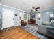 Bright living room with hardwood floors, lots of light and neutral walls, creating a warm and inviting atmosphere at 416 Avery St, Garner, NC 27529