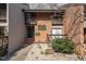 Charming brick townhome with private balcony and well-maintained landscaping at 4229 American Dr # F, Durham, NC 27705