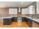 Modern kitchen with stainless steel appliances and granite countertops at 4229 American Dr # F, Durham, NC 27705