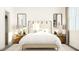 Well-lit main bedroom with modern decor, and bedside tables at 425 Cresting Wave Dr, Wake Forest, NC 27587