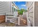 Multi-level deck and patio features a dining area and steps leading to the upper level of the backyard at 4303 Thetford Rd, Durham, NC 27707