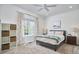 Comfortable bedroom with natural light, neutral tones, and cozy furnishings, creating a relaxing atmosphere at 4303 Thetford Rd, Durham, NC 27707