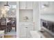 Dining room view showing built in, white cabinets and a clear view of the table at 4303 Thetford Rd, Durham, NC 27707