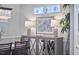 Charming dining room with ample natural light, custom sideboard, and stylish decor at 4303 Thetford Rd, Durham, NC 27707
