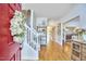 Welcoming foyer featuring hardwood floors, staircase, and an open view to the dining and living spaces at 4303 Thetford Rd, Durham, NC 27707