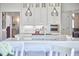 Open kitchen with a center island features stainless steel appliances and seating at the breakfast bar at 4303 Thetford Rd, Durham, NC 27707