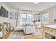 Inviting living space with a cozy couch, dining area, and ample natural light at 4303 Thetford Rd, Durham, NC 27707