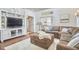 Inviting living room featuring a comfortable sofa, hardwood floors, and natural light at 4303 Thetford Rd, Durham, NC 27707