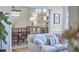 Open-concept living room view into dining room with stylish furniture and decor at 4303 Thetford Rd, Durham, NC 27707