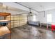 Functional garage space featuring ample storage and a durable roll-up door at 44 Loop Rd, Archer Lodge, NC 27527