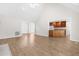 Bright living room featuring vaulted ceilings, modern flooring, and an open floor plan at 44 Loop Rd, Archer Lodge, NC 27527
