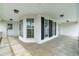 Spacious covered porch featuring ample room and multiple entry points to the home at 44 Loop Rd, Archer Lodge, NC 27527
