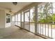 Screened-in porch with a ceiling fan, offering a relaxing space with views of the backyard at 44 Loop Rd, Archer Lodge, NC 27527