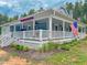 Charming home featuring a full wraparound porch with ceiling fans and beautiful mature landscaping at 468 Loftis Loop Rd, Roxboro, NC 27574