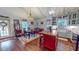 Charming kitchen with an island, farm sink, and dining area at 468 Loftis Loop Rd, Roxboro, NC 27574