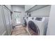 Spacious laundry room with washer, dryer, and ample storage at 468 Loftis Loop Rd, Roxboro, NC 27574