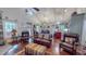 Spacious living room with vaulted ceilings, hardwood floors, and a view to the kitchen at 468 Loftis Loop Rd, Roxboro, NC 27574