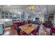 Open floor plan integrating a kitchen, dining area, and living space with beautiful wood flooring at 468 Loftis Loop Rd, Roxboro, NC 27574