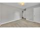 Neutral bedroom featuring a ceiling light and access to an ensuite bathroom at 503 N Sellers St, Selma, NC 27576