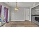 Dining room with sliding glass doors and laundry room access at 503 N Sellers St, Selma, NC 27576