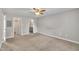 Comfortable primary bedroom with neutral walls, plush carpeting, and ensuite bathroom access at 503 N Sellers St, Selma, NC 27576