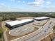 Aerial view of distribution centers with ample parking and road access, ideal for logistics operations at 508 Moore Hill Way, Holly Springs, NC 27540