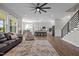 Spacious living room seamlessly connects to the kitchen and dining area, perfect for modern living at 508 Moore Hill Way, Holly Springs, NC 27540