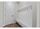 Mudroom with seating, coat hooks and storage at 508 Moore Hill Way, Holly Springs, NC 27540