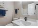 Modern bathroom with sleek fixtures, quartz countertops, and minimalist design at 7825 Breckon Way, Raleigh, NC 27615