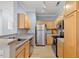 Well-equipped kitchen with stainless steel appliances and ample cabinet space at 800 Moratuck Dr # 108, Raleigh, NC 27604