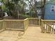 New wooden back deck with railings overlooking the backyard at 801 N Elm St, Durham, NC 27701
