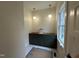 Bathroom with modern lighting, stylish vanity, and ample natural light at 801 N Elm St, Durham, NC 27701