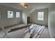 Bedroom with multiple windows providing natural light, with hardwood floors at 801 N Elm St, Durham, NC 27701