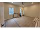 Bright bedroom featuring hardwood floors, a ceiling fan, and natural light from the window at 801 N Elm St, Durham, NC 27701