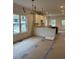 Bright kitchen space with white cabinets and modern lighting at 801 N Elm St, Durham, NC 27701