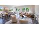 Inviting living and dining area with neutral tones and lots of natural light at 804 Windmill Palm Dr, Zebulon, NC 27597