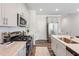 Charming kitchen with stainless steel appliances, ample cabinet space, and modern countertops at 812 Windmill Palm Dr, Zebulon, NC 27597