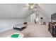 Neutral bonus room with carpet, ceiling fan, neutral walls and a window that lets in natural light at 8925 Hopkins Knob Ct, Zebulon, NC 27597