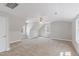 Large carpeted bedroom with a ceiling fan, large windows, and neutral color scheme at 912 Sethcreek Dr, Fuquay Varina, NC 27526