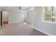 Well-lit bedroom with a large window and plush carpeting at 912 Sethcreek Dr, Fuquay Varina, NC 27526