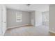 Spacious bedroom with carpet floors and ample natural light at 912 Sethcreek Dr, Fuquay Varina, NC 27526