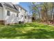 The home's exterior showcases well-maintained landscaping and a sprawling green lawn at 912 Sethcreek Dr, Fuquay Varina, NC 27526